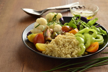 Vegetarian salad with quinoa, vegetables and sunflower seeds. Buddha bowl, copy space