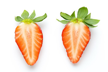 Ripe half strawberry isolated on white background.