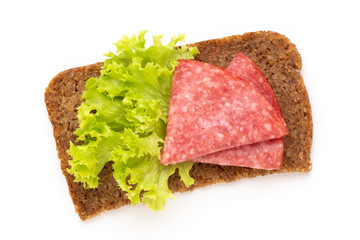 Sandwich with salami sausage on white background.