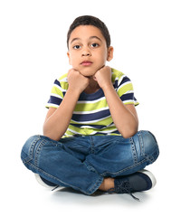 Portrait of cute little boy on white background