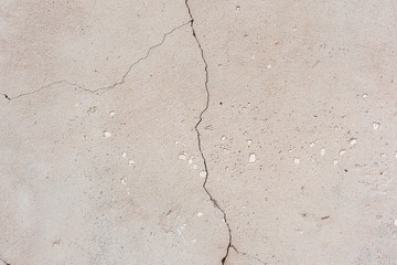 Texture, wall, concrete, it can be used as a background. Wall fragment with scratches and cracks