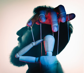 Marionette in male head. Concept of mind control. Image
