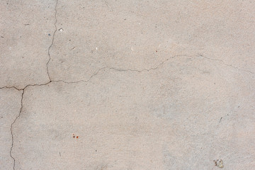 Texture, wall, concrete, it can be used as a background. Wall fragment with scratches and cracks