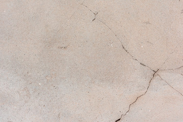 Texture, wall, concrete, it can be used as a background. Wall fragment with scratches and cracks