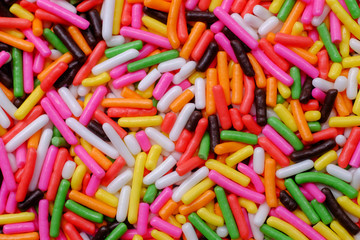 Fototapeta na wymiar colorful sugar sprinkles as background