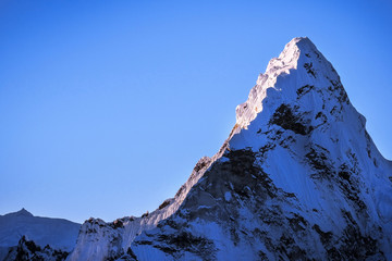 Snowy mountains peaks during sunset. Nepal Himalayan