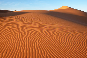 Fototapeta na wymiar Sand dunes in the Sahara desert. Merzuga, Morocco