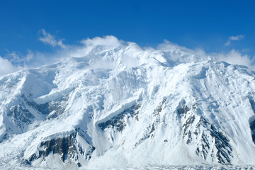 Fototapeta na wymiar Panoramic view of Mount Everest, Himalayas nepal. Snow flags on the summit