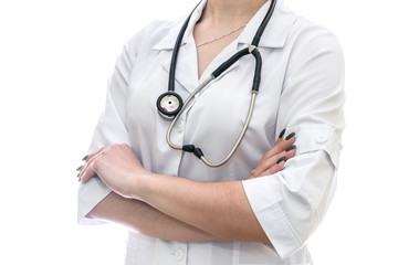 Doctor posing with crossed hands isolated on white