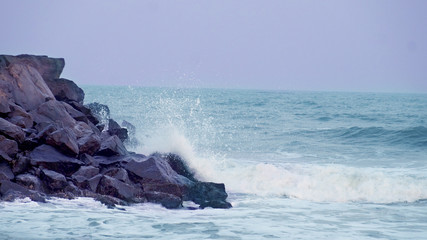 waves crashing on rocks