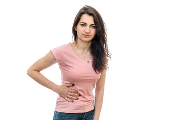 Woman with hand on belly with ache isolated on white