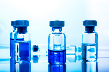 Medical concept Vaccination vaccine vial dose flu shot drug needle syringe
