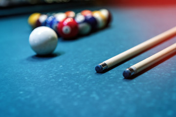 Billiard balls in triangle with cue on table
