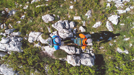 Couple of hikers hiking on a sunny day