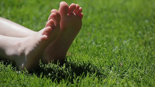 children girl foot grass background hd footage 
