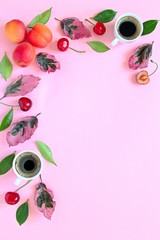 Coffee with fruits and follies on pink background. Top view with copy space. Flet lay style. Summer concept. © Ale02