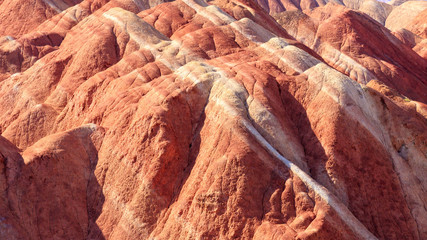 red and white striped rock formations