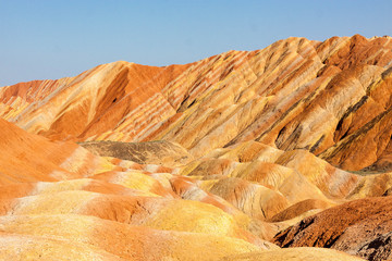 Brightly colored sandstone mountains in China