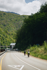 cyclists on the mountain road