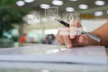 Businessman manager signing documents with human resources employment (HR) icon. Document reports...