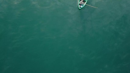 fishing on Sapanca lake, low altitude top down drone footage, sm01 - Powered by Adobe