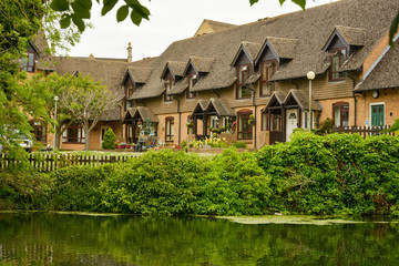 Stamford, England, May 31, 2019 - resident houses along the river. Traditional english houses.