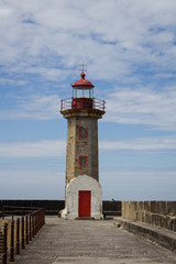 Fototapeta na wymiar Beautiful Felgueiras Lighthouse on Atlantic Ocean in Porto, Portugal. Travel concept