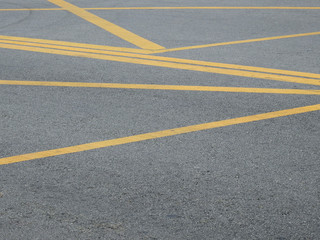 asphalt road with yellow line texture