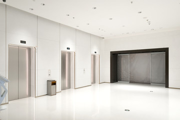 The elevator entrance is in the shopping mall