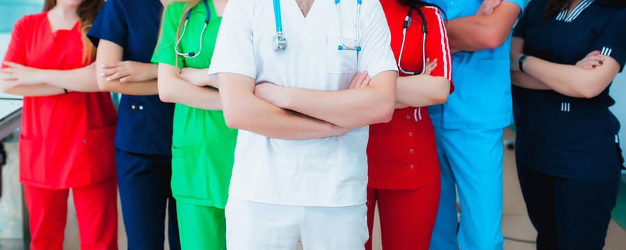 profession medicine staff. multinational people - doctor, nurse and surgeon. a group of faceless doctors. medical advertisement design. background wide promotional banner