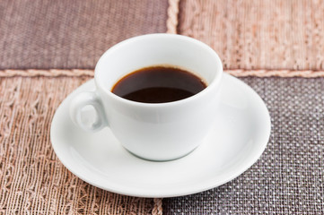 White coffee cup on the table.Coffee time