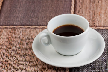 White coffee cup on the table.Coffee time