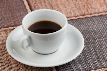 White coffee cup on the table.Coffee time