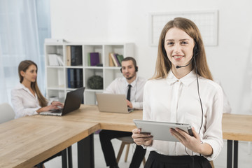 Fototapeta premium Portrait of woman working in call center