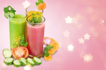 Healthy  vegetable juices on background