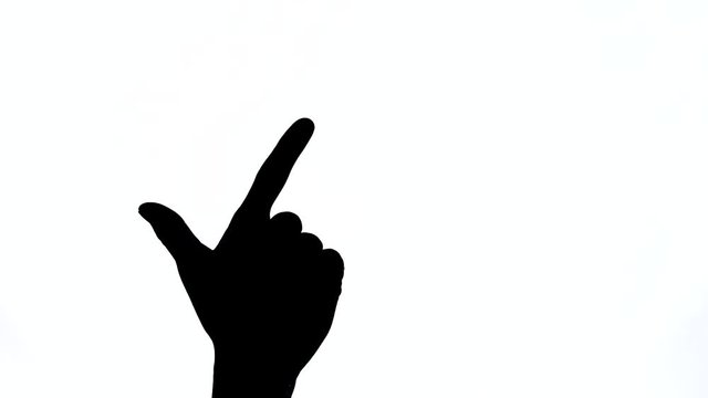 A close-up of male hand posturing to be shotgun, concept of firmness and got the aim. You got it right symbol. Isolated, black and white contrast shot