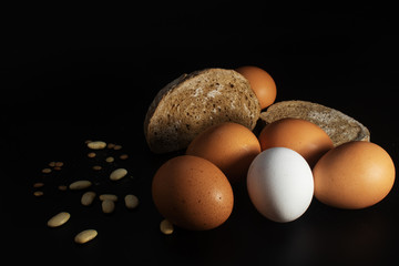 Fallen wicker basket with village eggs.