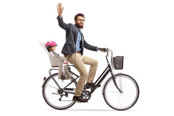 Father riding a child in a bicycle child's seat and waving at the camera