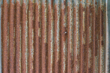 Abstract texture of rusty metal. The corrosion of rusted on zinc wall.