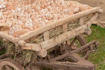 Traditional Rye flour bread cooked on site during the "Speckfest" celebration in Val di Funes, Dolomites.