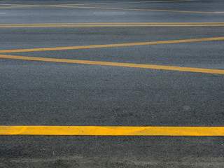 asphalt road with yellow line texture