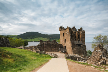 Fototapeta na wymiar Urquhart Castle along Loch Ness lake in Scotland