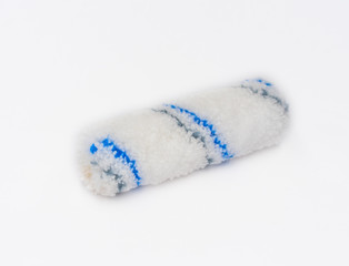 Nylon painting roller brush shot on white.