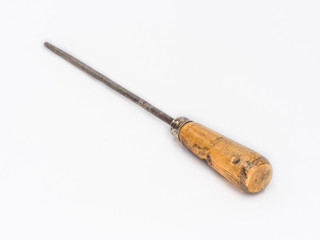 Old vintage round file with wooden handle shot on white.