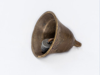 Obraz na płótnie Canvas Vintage bronze bell shot on white.