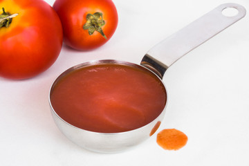 Tomato Sauce in a Measuring Cup