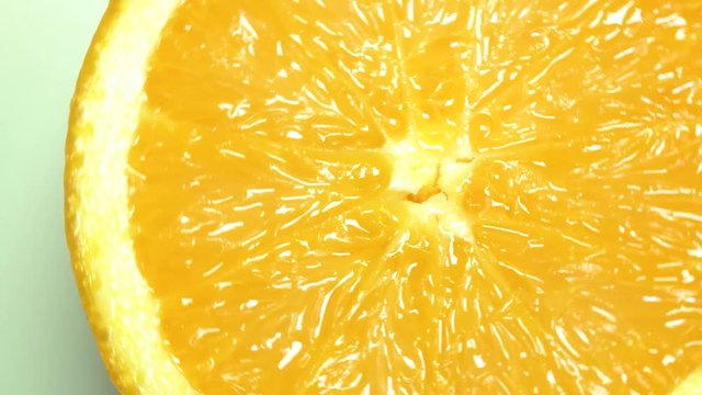 Orange lith rotating closeup, beautiful soft focus macro shot (HD, high definition 1080p, loop, seamless loop) orange pulp