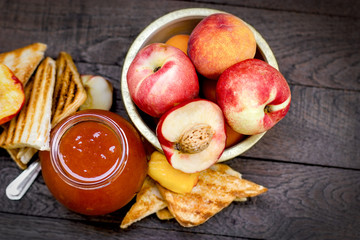 Peach jam, homemade peach marmalade and toast