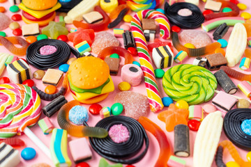 bright delicious multicolored caramel candies like background