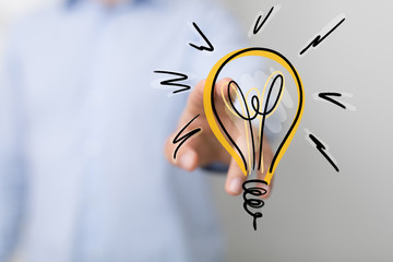 idea lamp concept in hand
